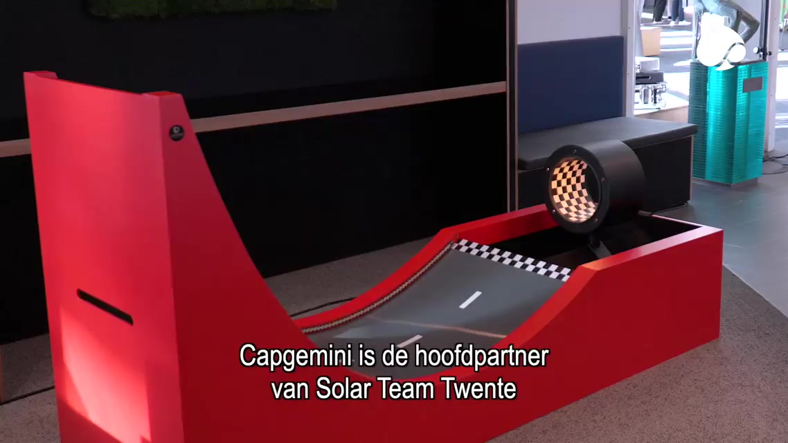 Red interactive miniature race track created for Capgemini and Solar Team Twente
